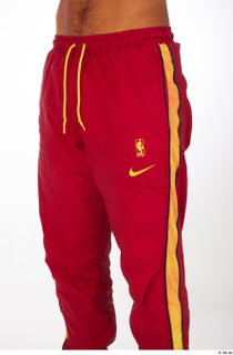 Nabil dressed red athletic track pants sports thigh 0002.jpg